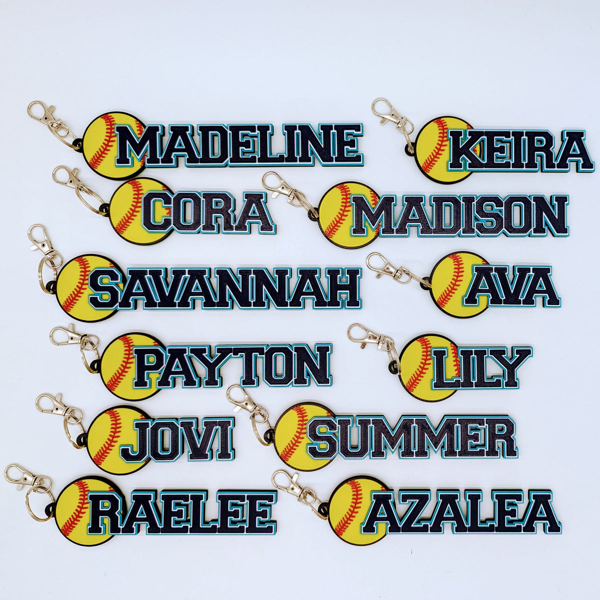 Twelve softball bag tags in navy and teal for a full team roster