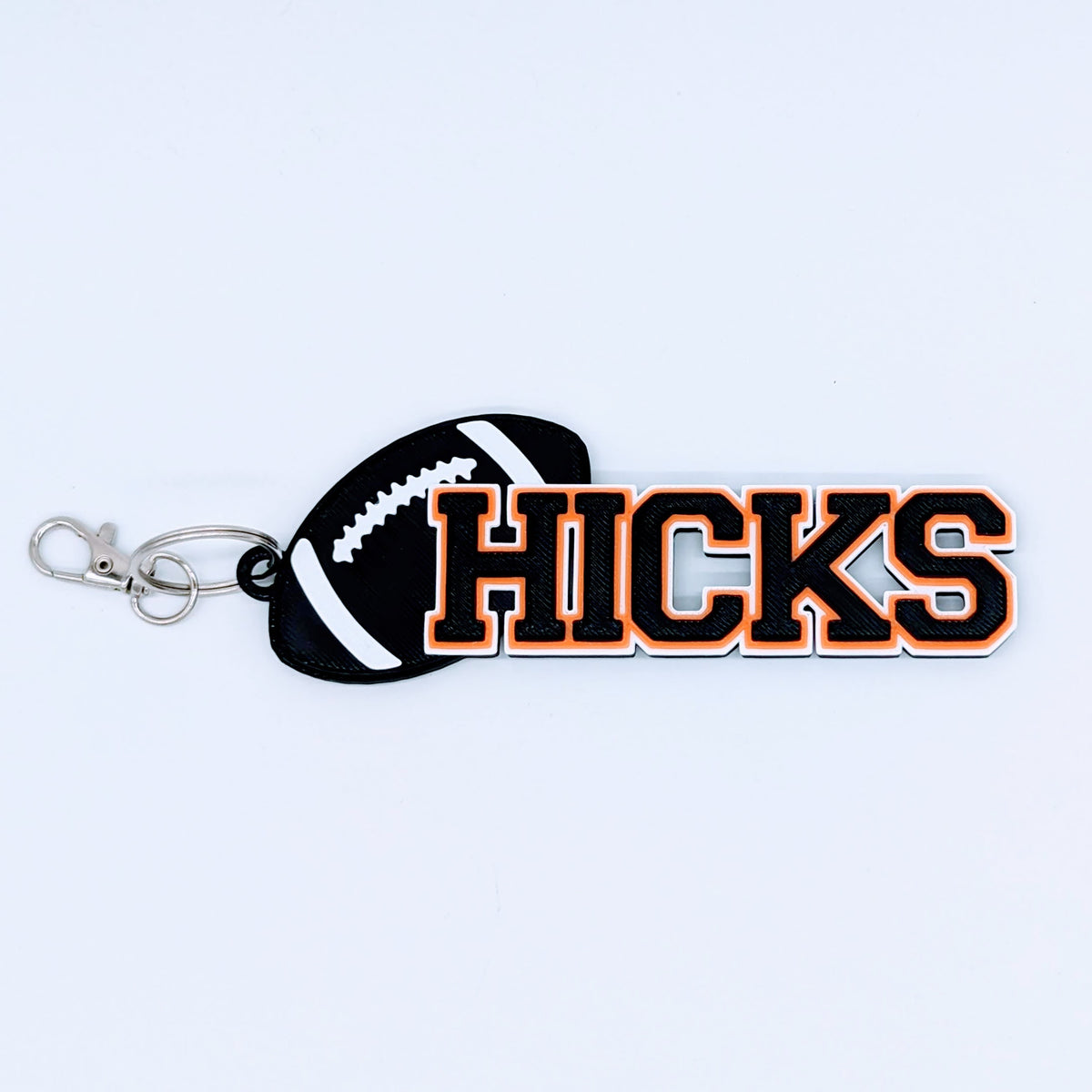 Personalized football bag tag with name and number