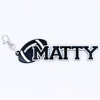 Personalized football bag tag with name and number