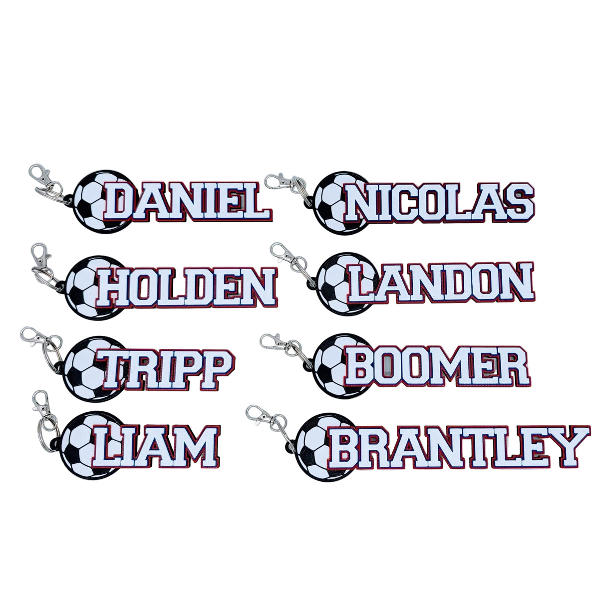 Eight soccer bag tags in white and red for a full team roster