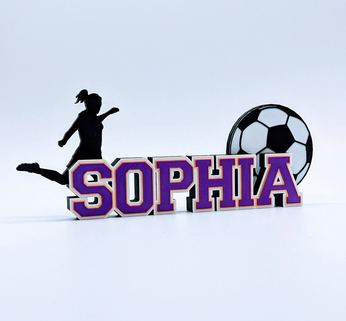 Girls soccer nameplate "SOPHIA" in purple and pink with soccer ball