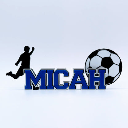 Personalized soccer nameplate "MICAH" in royal blue with player and ball