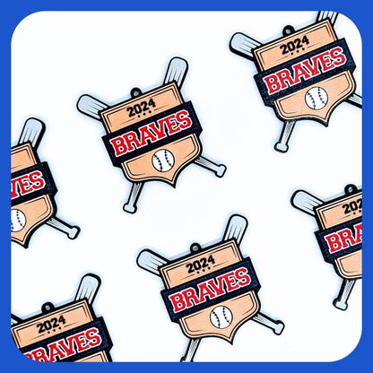 Set of custom team medals with gold shields and crossed silver bats