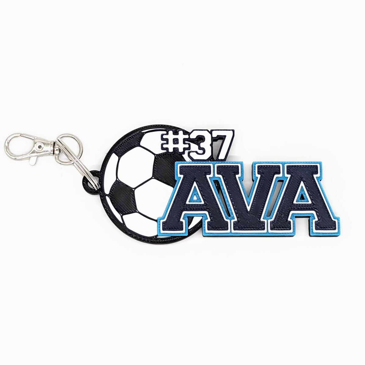 Soccer bag tag "AVA #37" in navy and light blue with number