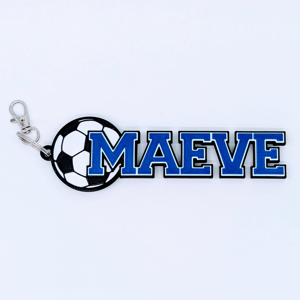 Soccer bag tag "MAEVE" in royal blue with soccer ball and clip