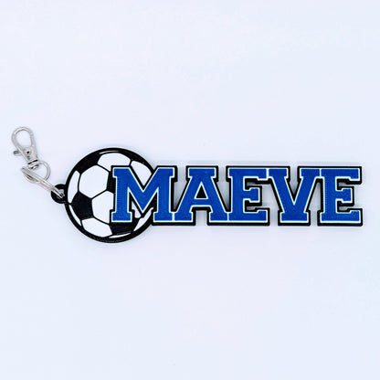 Soccer bag tag "MAEVE" in royal blue with soccer ball and clip