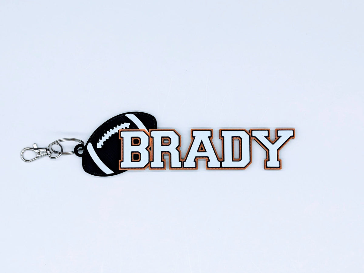Personalized football bag tag with name and number