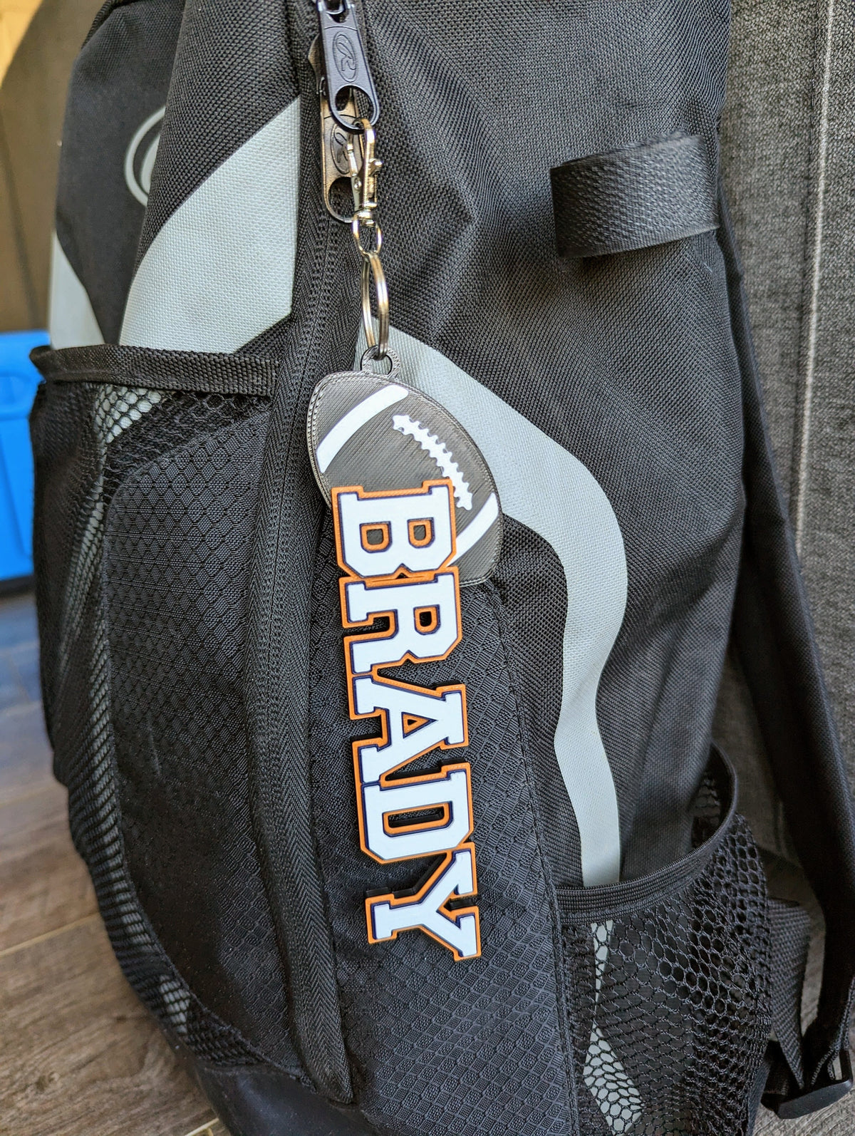 Personalized football bag tag with name and number